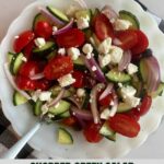 A bowl of Chopped Greek Salad with the Healthy Mom Healthy Family logo.