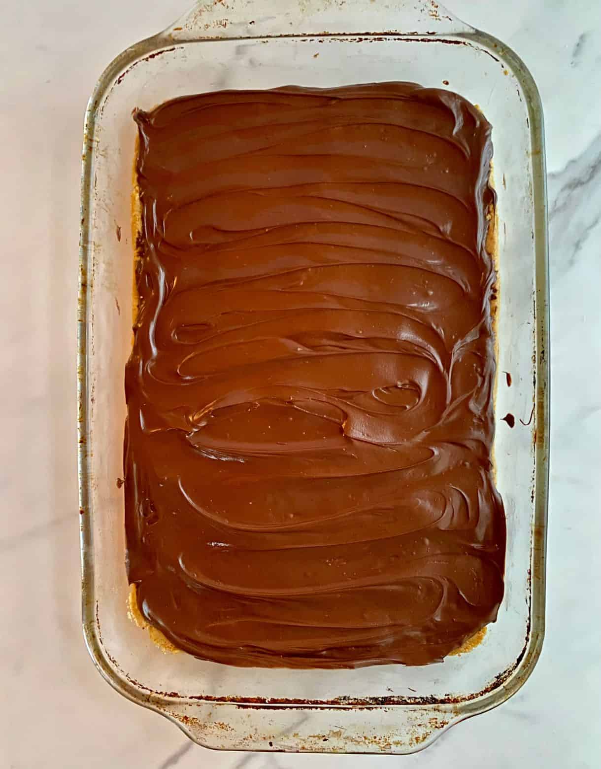 A pan of No-Bake Chocolate Peanut Butter Bars not cut up yet.