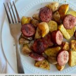 A plate of oven roasted smoked sausage and potatoes.