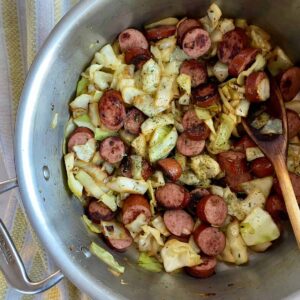 A skillet of cooked Southern Fried Cabbage with Sausage.