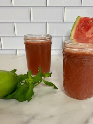 Two glasses of watermelon and cucumber juice.